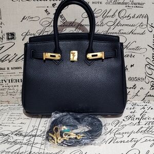 Chic Black Satchel with Gold Accents